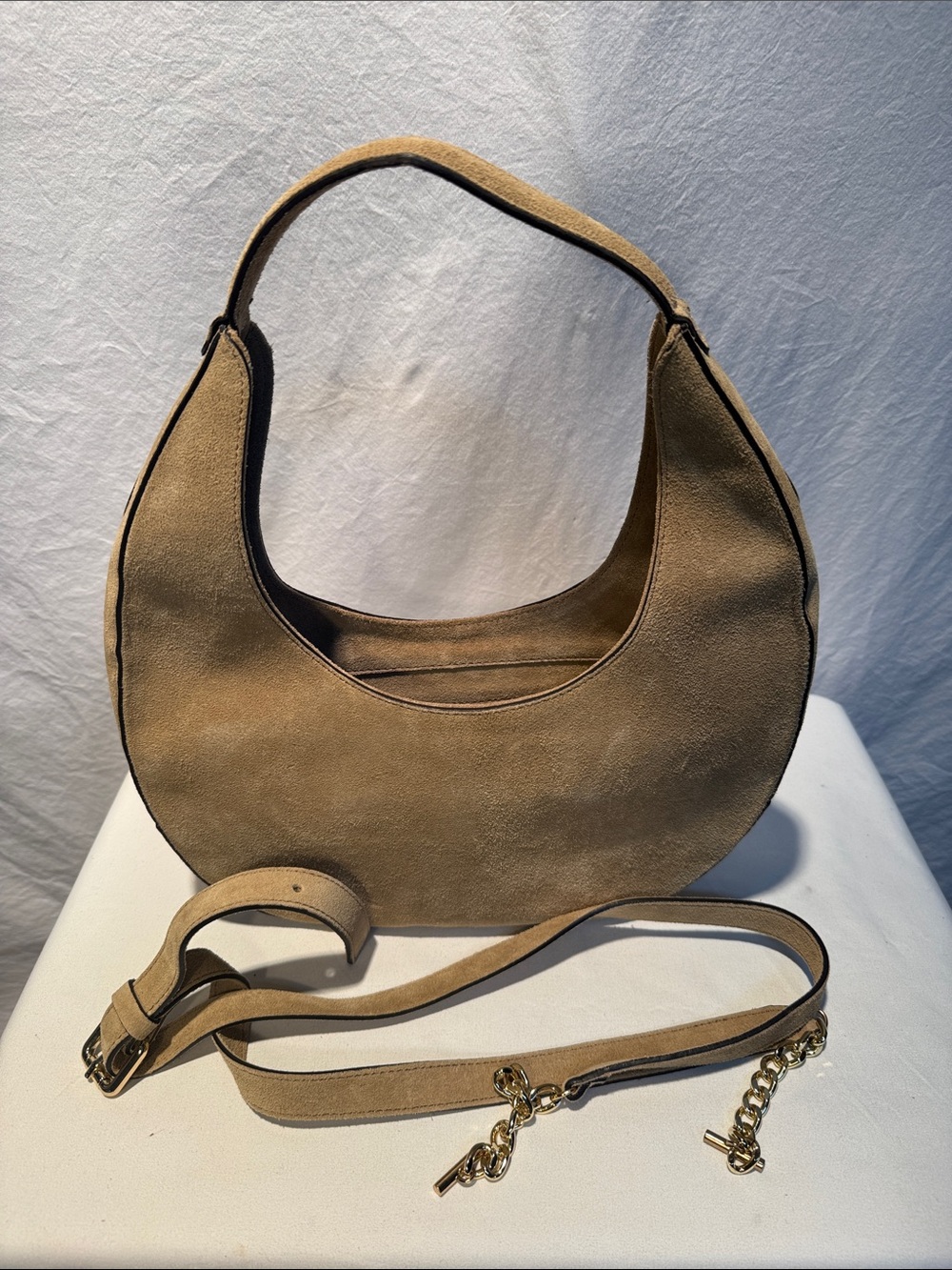 Amerai Tan Suede Crescent Shoulder Bag with Gold Chain Accents